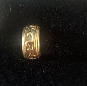 Gold toned pierced hoop scrollwork earrings, (Silver .925)